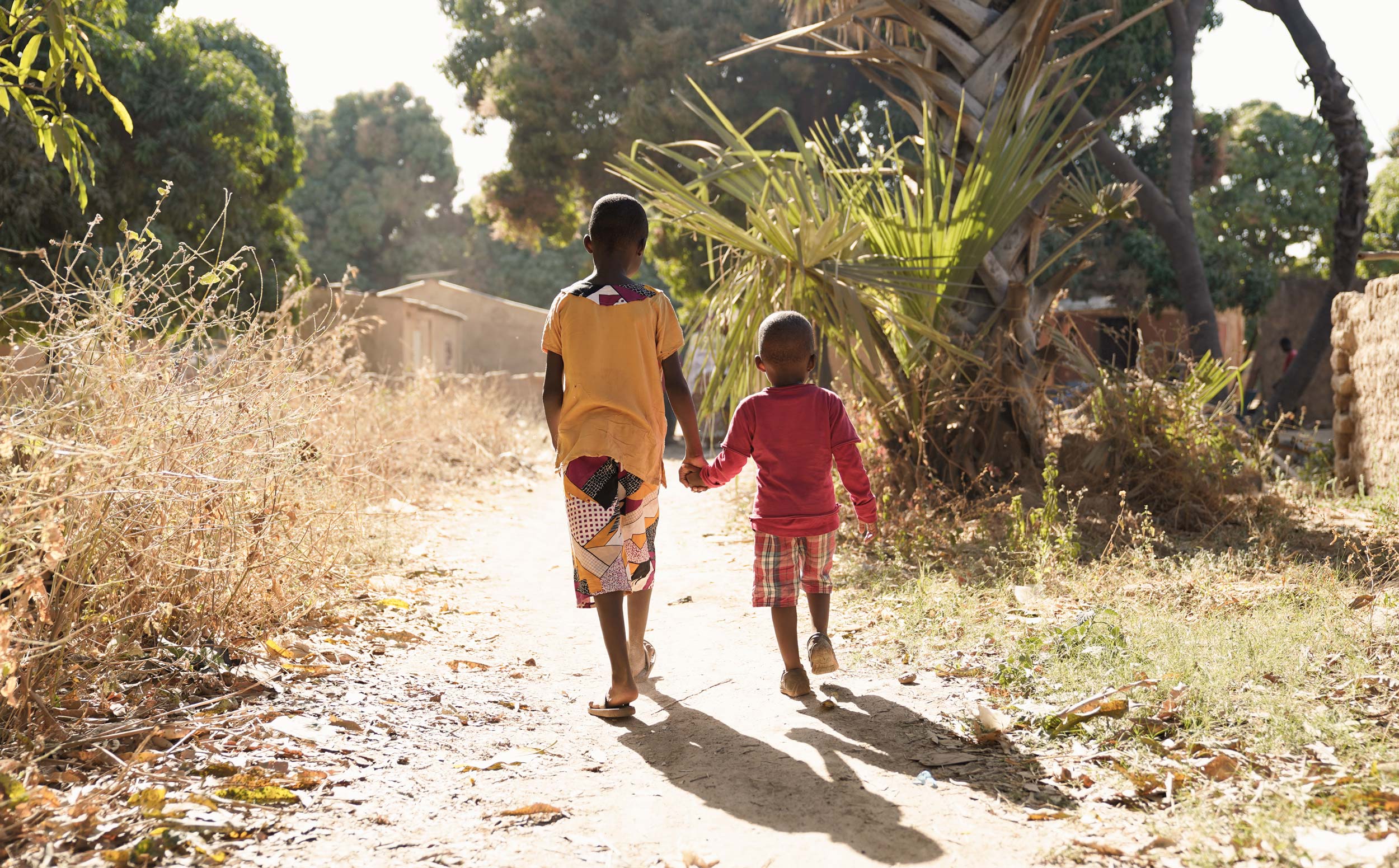 Boys-walking-holding-hands-PS2500 Boys walking holding hands